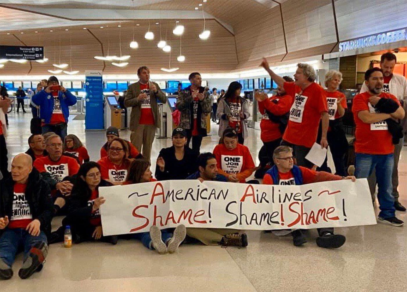 Three SF Supes Among 50 Arrested At SFO Protest For Higher Catering Wages