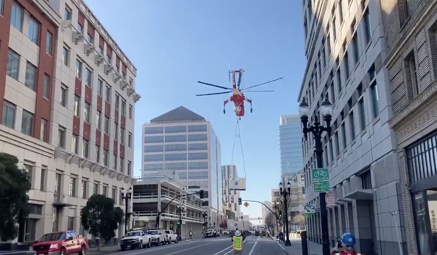 Video Captures Moment That Helicopter Drops Enormous A/C Unit On Downtown Oakland Street