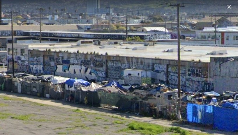 Beleaguered Oakland Encampment Getting $4.7 Million Grant From State to Try ‘New Model’