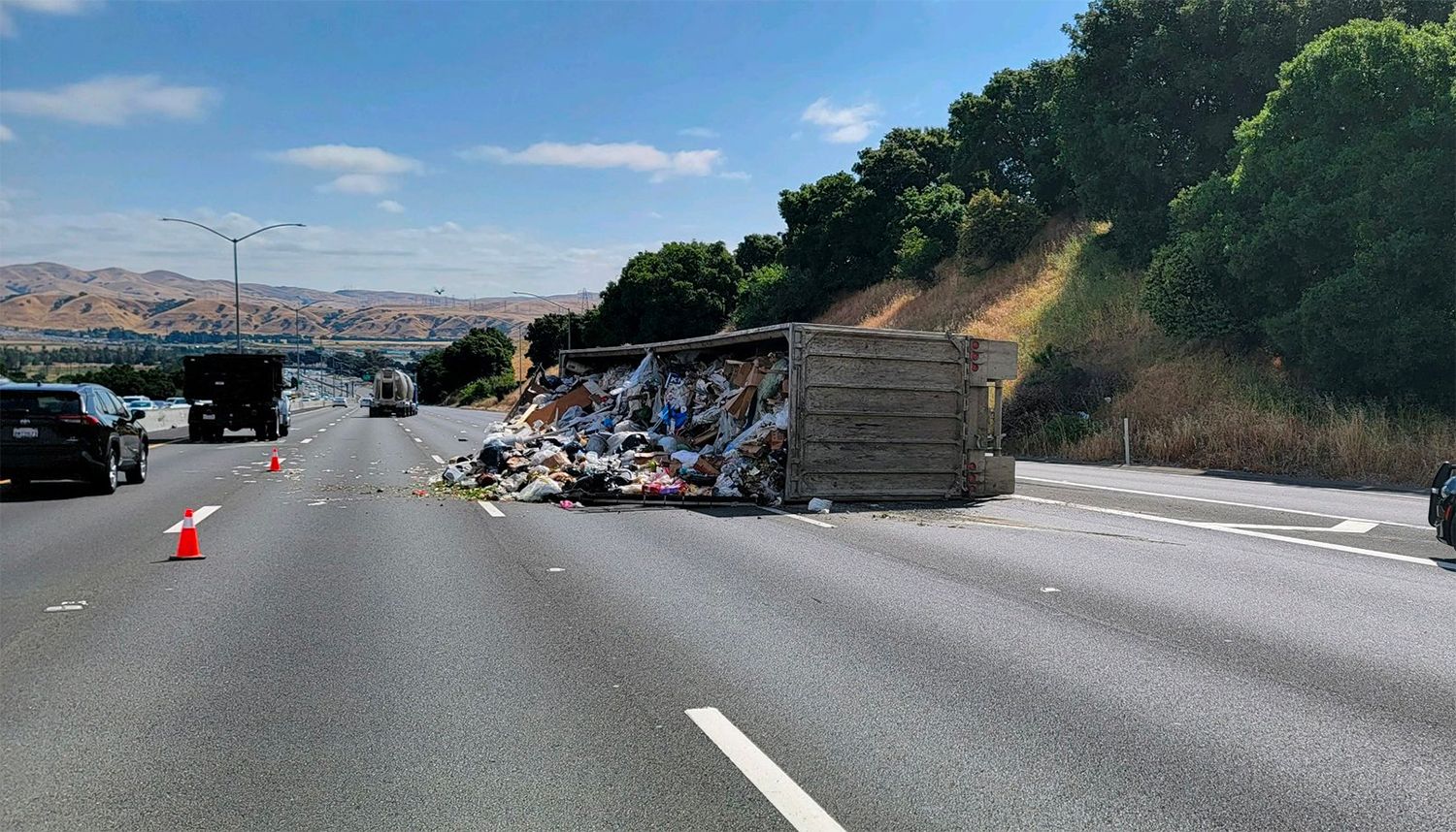 Overturned Garbage Truck, Landscaping Truck on Fire Cause Bay Area Freeway Backups