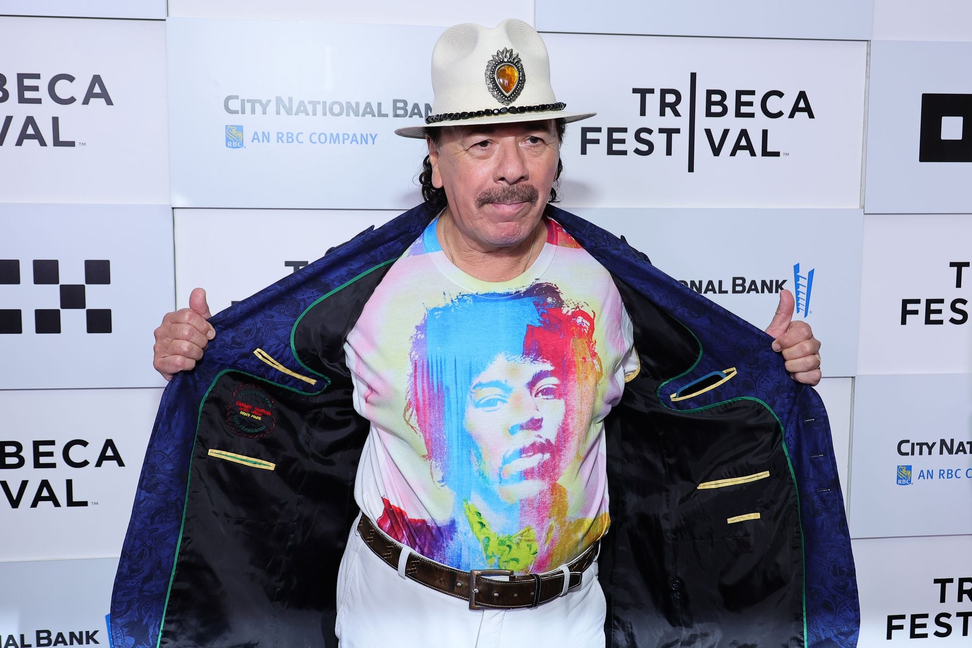 Welp, Time to Add Carlos Santana to the Anti-Trans Celebrity List After Bizarre Onstage Rant