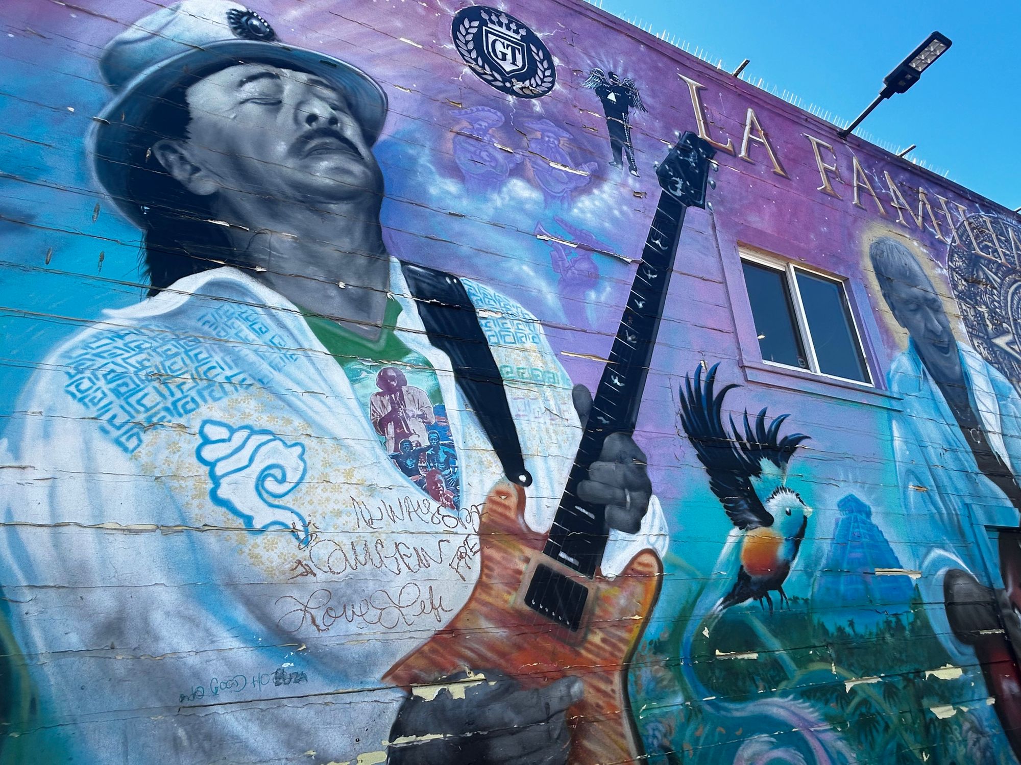 Mission Fried Chicken Joint Hastily Removes Ads From Carlos Santana Mural After Backlash