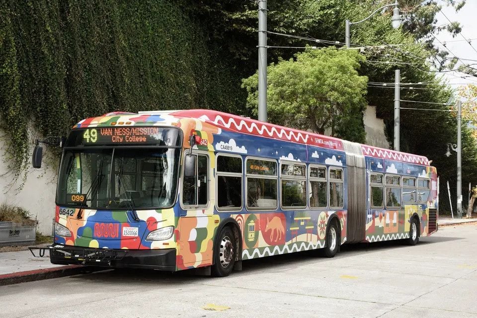 Muni Gussies Up 49-Van Ness Buses With Holiday Wraparound Decorative Furbishing