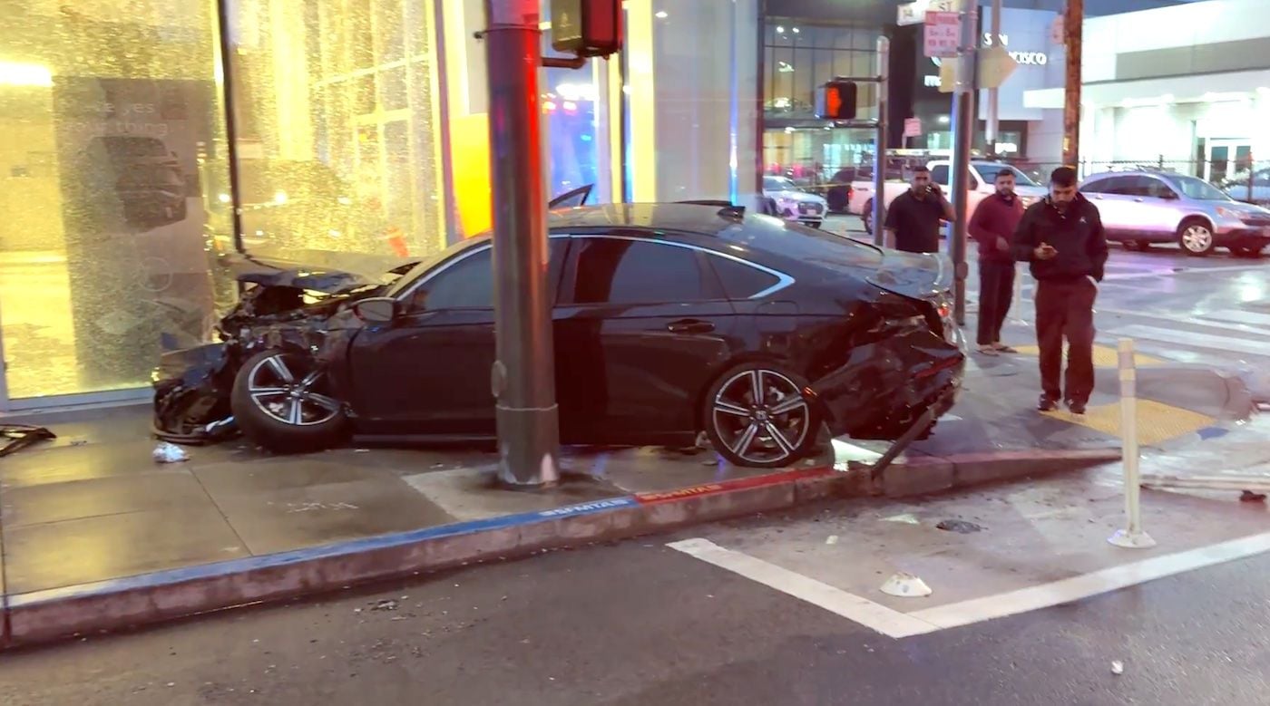Driver Fleeing SFPD Collides With Car In Mission Then Smashes Dealership Windows, Injuring Eight