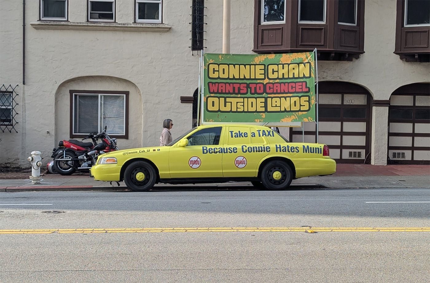 Friday Morning Constitutional: Connie Chan Troll Taxi Parked By Outside Lands Entrance